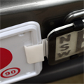 P-plate clip fitted under surround